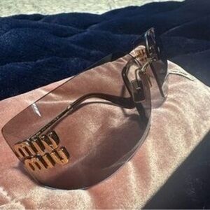 Miu Miu Gold Sunglasses with Pink Tint